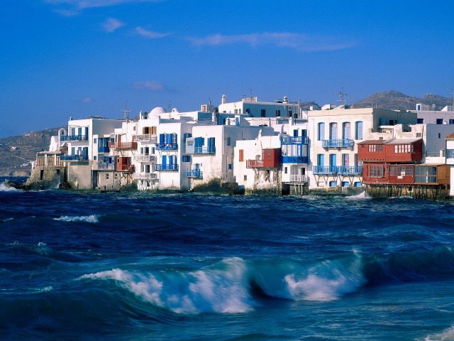 Houses cliff ocean waves blue free wallpaper - medium preview image