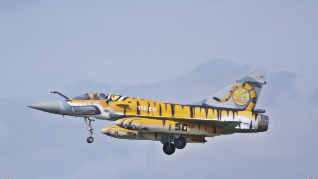 Yellow silver fighter jet cloudy free wallpaper - medium preview image