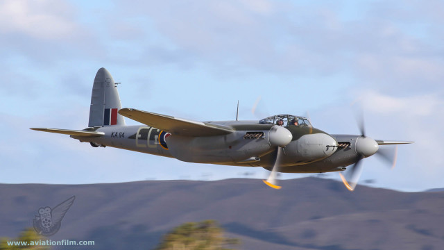 Propeller plane flying mountains clouds free wallpaper - medium preview image