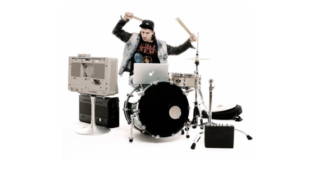 Man baseball cap playing drums free wallpaper - medium preview image
