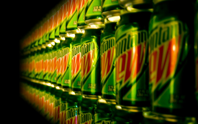 Soda cans closeup lights black free wallpaper - medium preview image