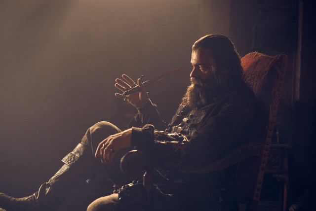 Long haired man sitting portrait free wallpaper - medium preview image