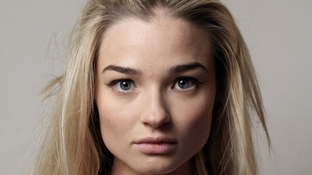 Blonde woman blue eyes serious #3 free wallpaper - medium preview image