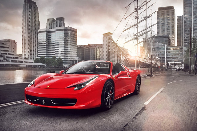 Red sports car cityscape bridge #2 free wallpaper - medium preview image