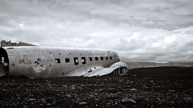 Plane ground dirt rocks cloudy free wallpaper for desktop - medium preview image