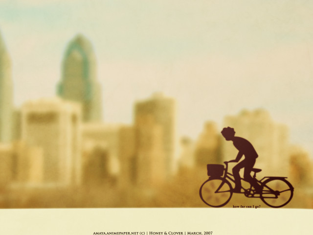 Man bike city skyline blurry free wallpaper - medium preview image