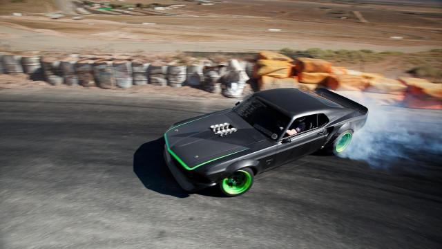 Black car green wheels road free wallpaper - medium preview image