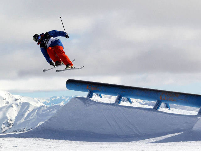 Skier midair rail snow mountains free wallpaper - medium preview image