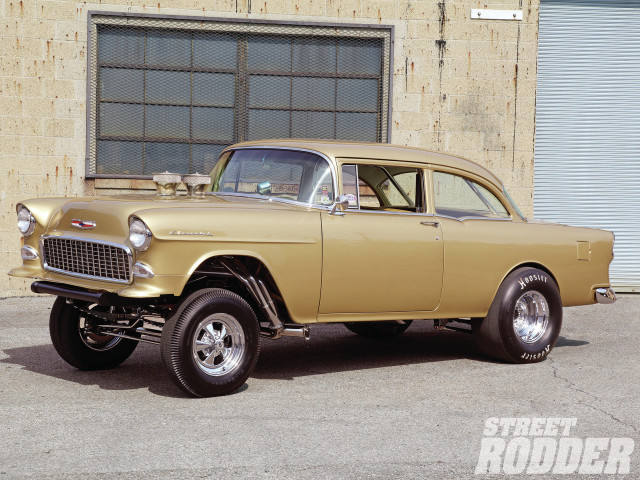 Tan car parked building street free wallpaper - medium preview image