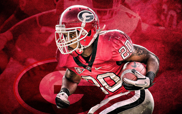 Football player red uniform holding free wallpaper - medium preview image