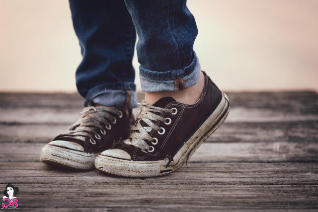 Person standing platform brown sneakers free wallpaper - medium preview image