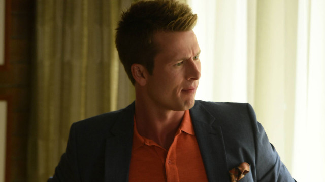 Man suit orange shirt serious free wallpaper - medium preview image