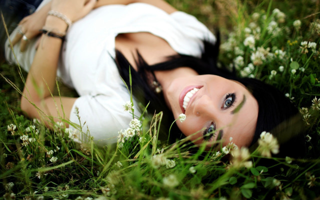 Woman laying grass smiling nature #2 free wallpaper - medium preview image