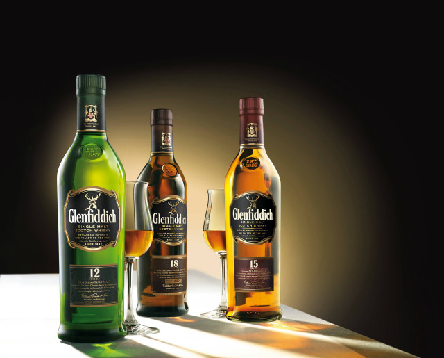 Three bottles alcohol table glass free wallpaper - medium preview image