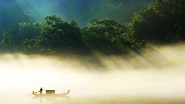 Man in boat lake foggy free wallpaper - medium preview image