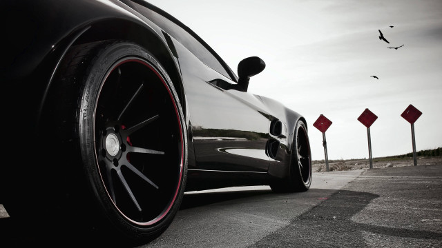 Black car red white signs free wallpaper - medium preview image