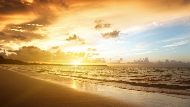 Sunset ocean beach clouds mountain free wallpaper - medium preview image