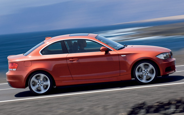 Red car ocean road beach free wallpaper - medium preview image