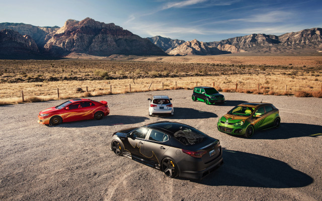 Four cars mountains fenced puzzle free wallpaper - medium preview image