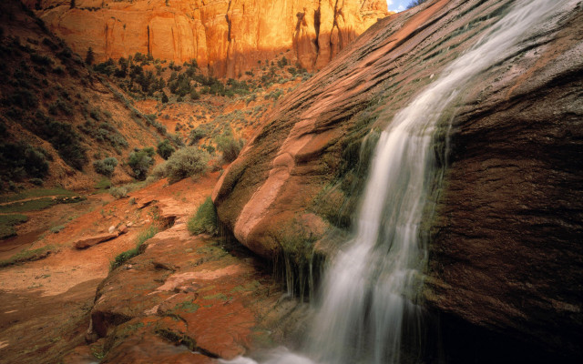 Waterfall desert rocks trees sunset free wallpaper - medium preview image