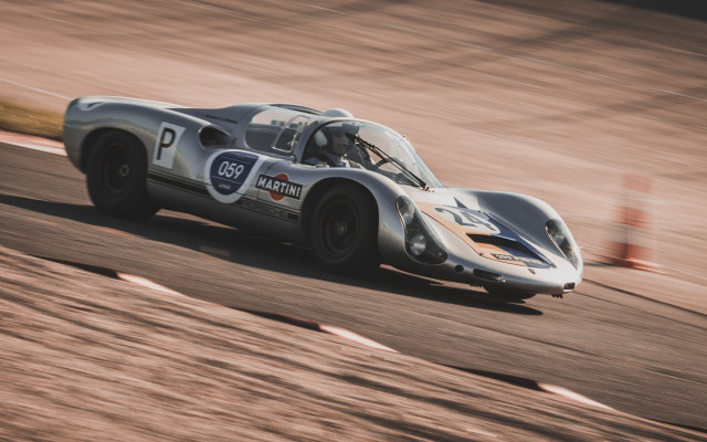 Silver racecar motionblur numbered photorealism free wallpaper - medium preview image