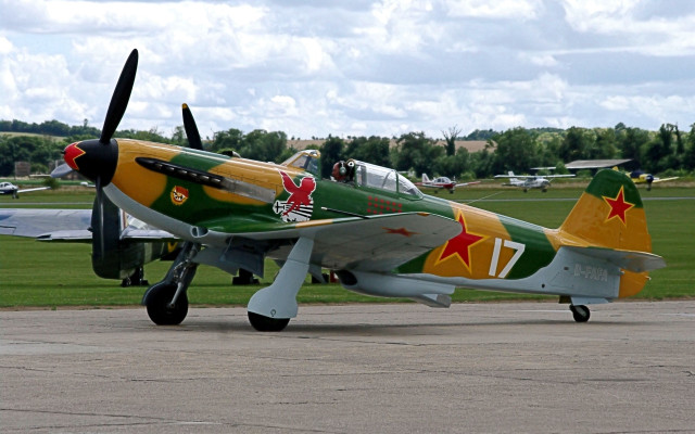 Small green yellow airplane runway free wallpaper - medium preview image