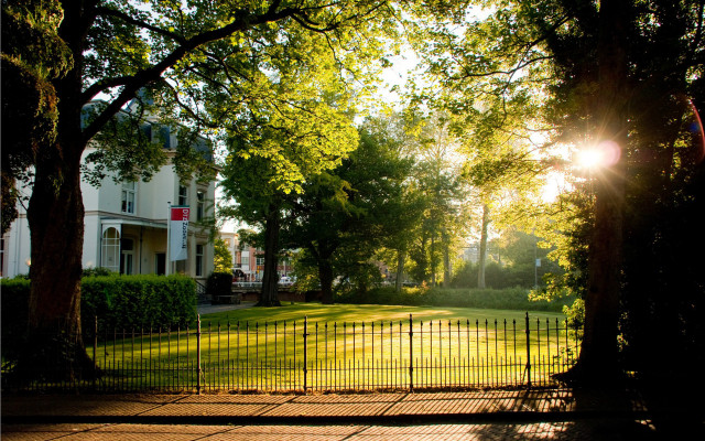 Gated grassy trees house autumn free wallpaper - medium preview image
