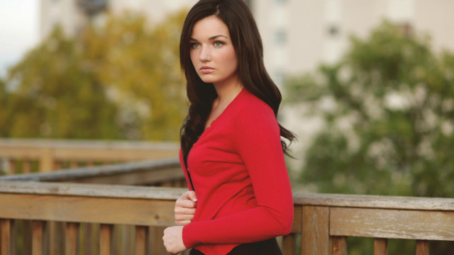 Woman red top bridge portrait free wallpaper - medium preview image