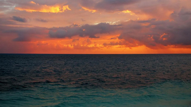 Sunset ocean clouds boat beach free wallpaper - medium preview image