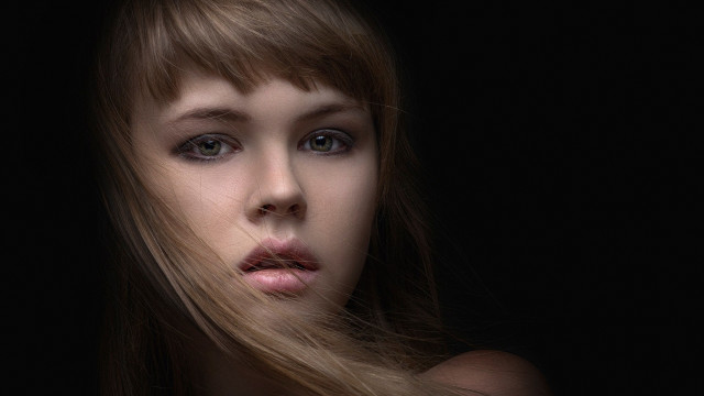 Woman longhair blackbackground serious look free wallpaper - medium preview image