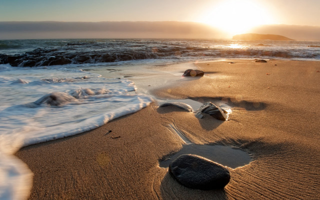 Beach waves sunset rock sand free wallpaper - medium preview image