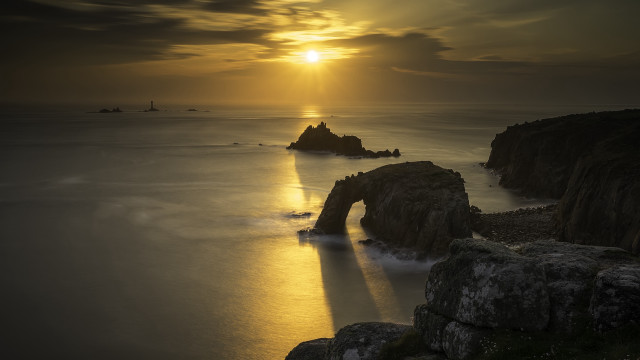 Sunset water rock boat horizon free wallpaper - medium preview image