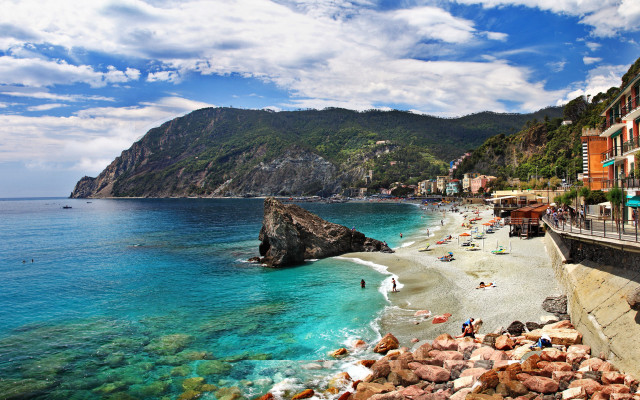 Beach mountain sky water people free wallpaper - medium preview image