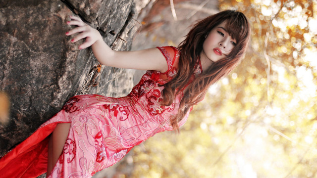 Woman red dress rock wall free wallpaper - medium preview image
