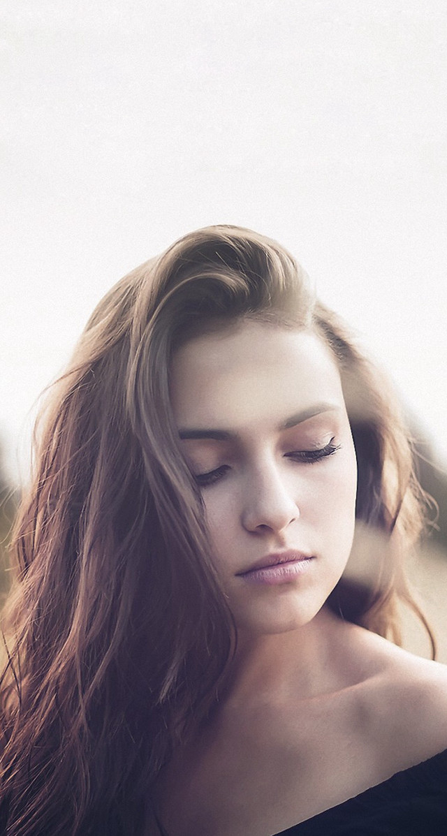 Woman longhair cellphone field portrait free wallpaper - medium preview image