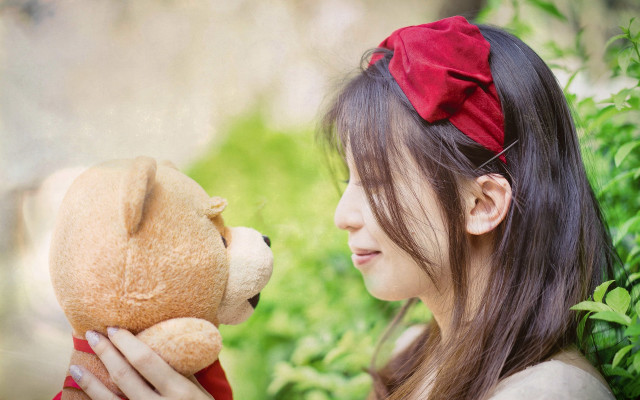 Woman teddy bear smiling red free wallpaper - medium preview image