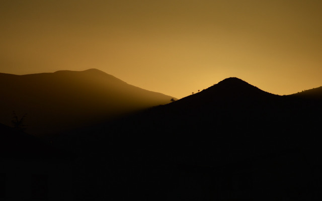 Mountain hills bird trees sunset free wallpaper - medium preview image