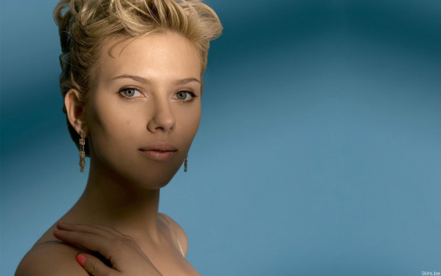 Woman short hair earing blue free wallpaper for desktop - medium preview image