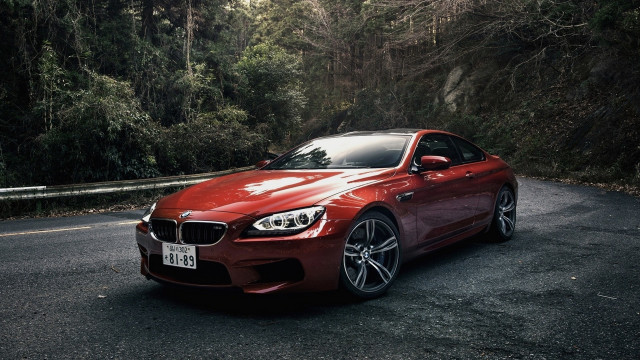 Red car forest road night free wallpaper - medium preview image