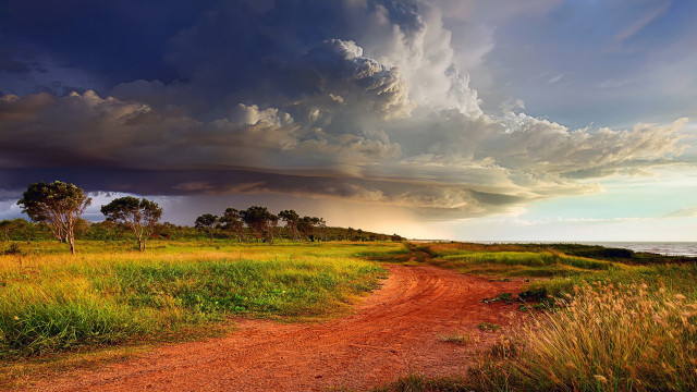 Dirt road field stormy sky free wallpaper - medium preview image