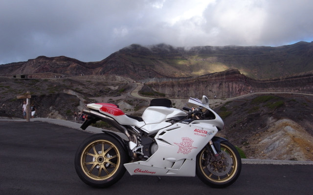 White motorcycle mountain road cloudy free wallpaper - medium preview image