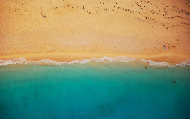Beach people water sunset shadows free wallpaper for desktop - medium preview image
