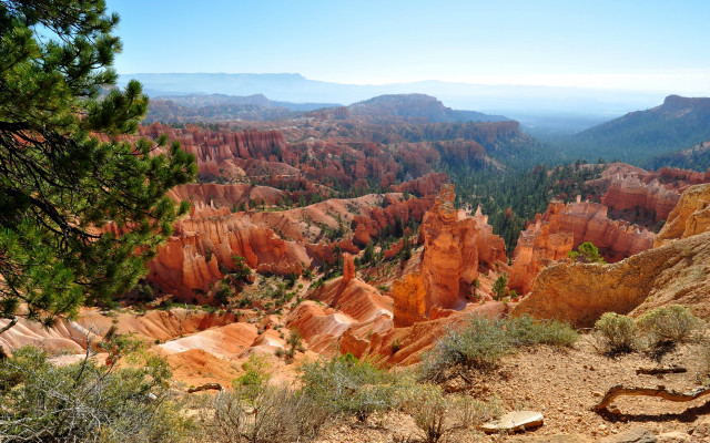 Valley mountains trees blue sky free wallpaper - medium preview image