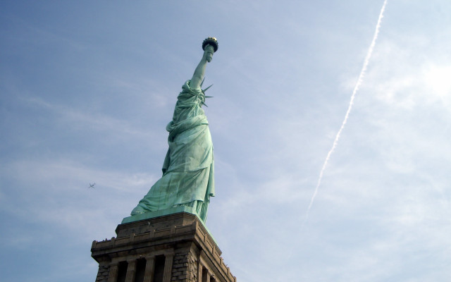 Statue liberity jet trail plane free wallpaper - medium preview image