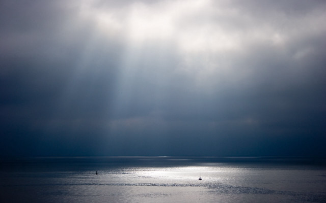 Boat ocean cloudy sky sunbeams free wallpaper - medium preview image