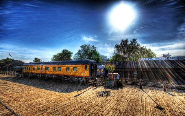 Train fence trees sky sun free wallpaper - medium preview image