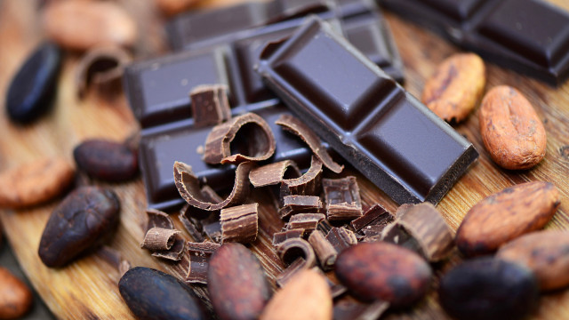 Wooden cutting board chocolate nuts free wallpaper - medium preview image