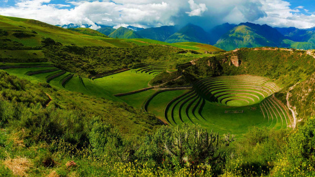 Grassy field spiral structure mountain free wallpaper - medium preview image