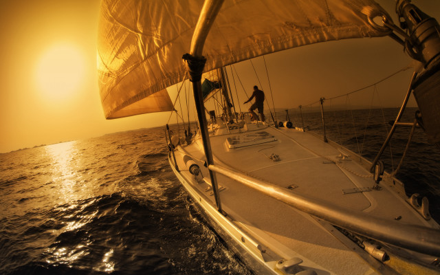 Sailboat sunset ocean man bridge free wallpaper - medium preview image