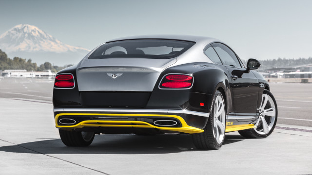 Black car yellow trim runway free wallpaper - medium preview image